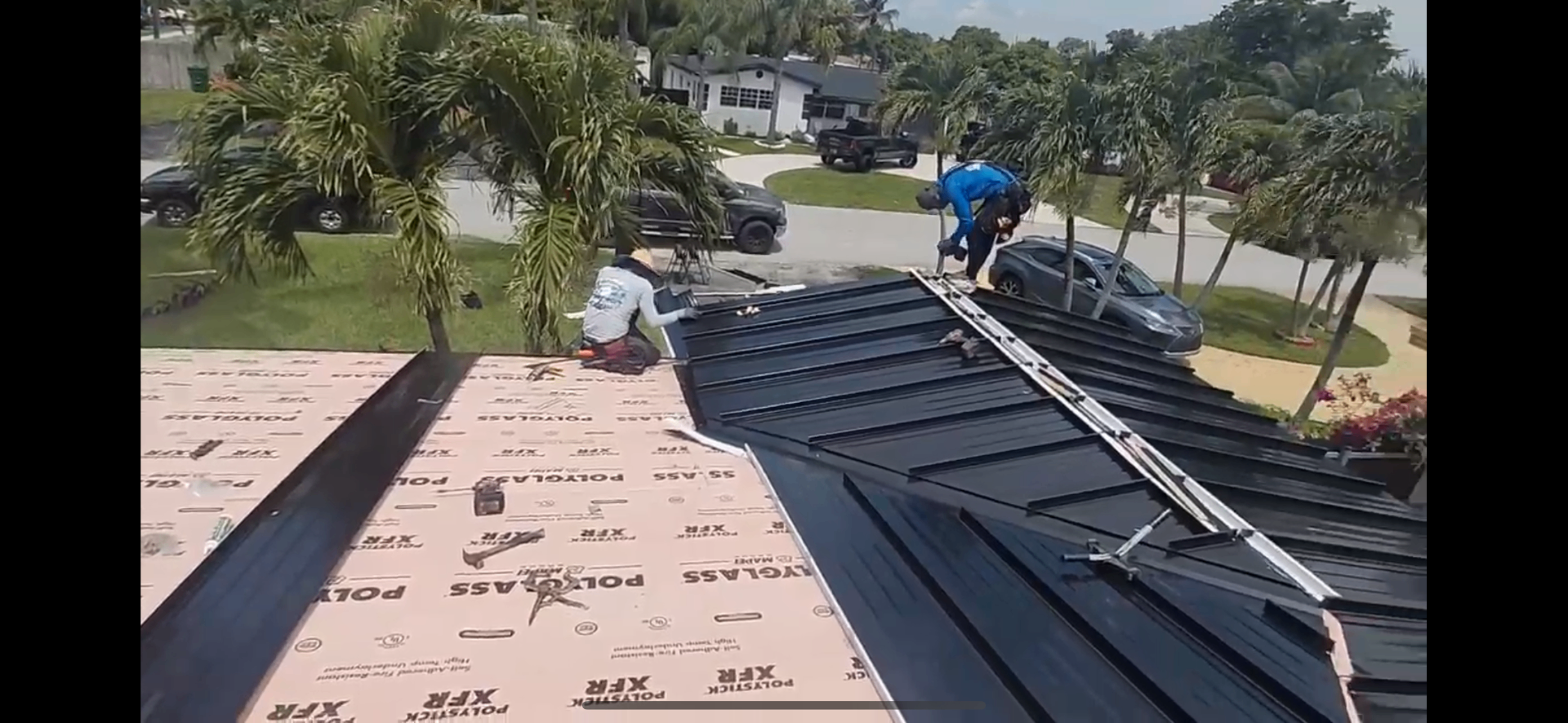 Metal roof installation in progress