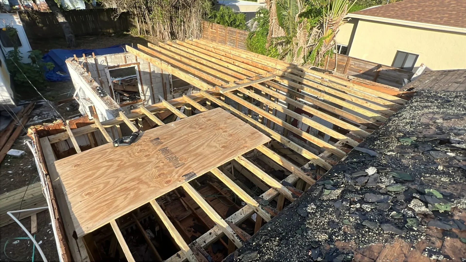 New roof framing and decking construction