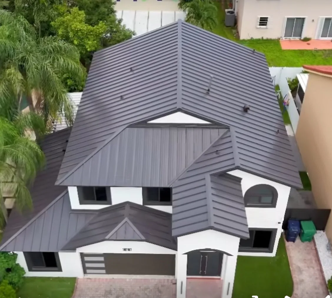 Aerial view of completed dark metal roof in Miami