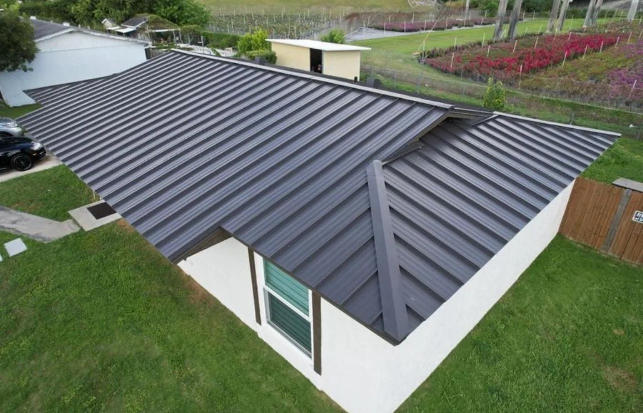 Standing seam charcoal metal roof installation